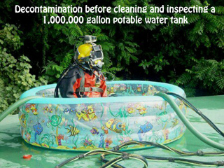 divers Decontamination before cleaning and inspecting a 1,000,000 gallon potable water tank